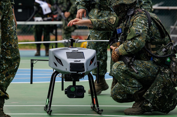 Soldiers prepare a Taiwanese military Tactical-2 unmanned aerial vehicle (UAV)